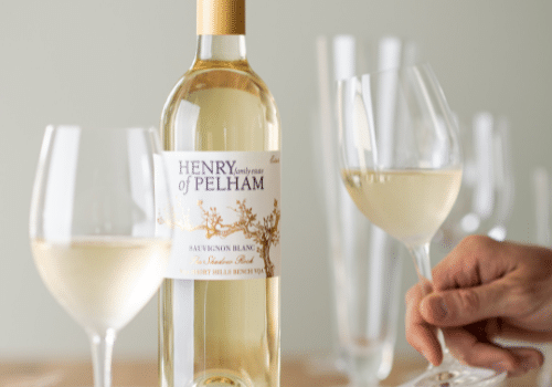 Henry of Pelham Sauvignon Blanc with two filled glasses